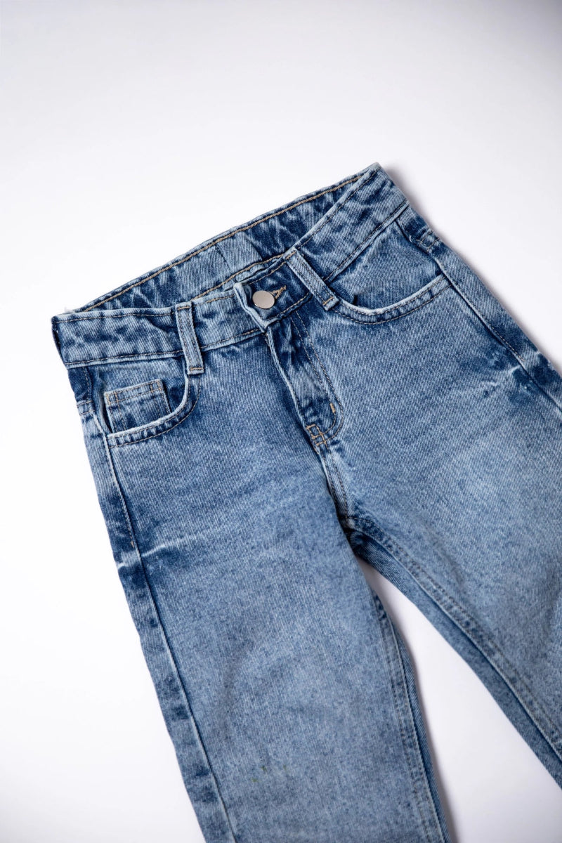 Pair of blue jeans on a white background