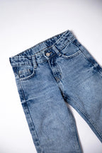 Pair of blue jeans on a white background
